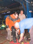 Pops doing up boots for Paul Leach Pops doing up boots for Paul Leach