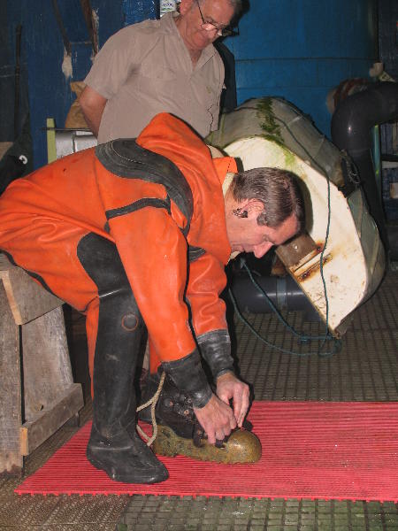 Paul Leach checking his boots