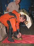 Paul Leach checking his boots Paul Leach checking his boots